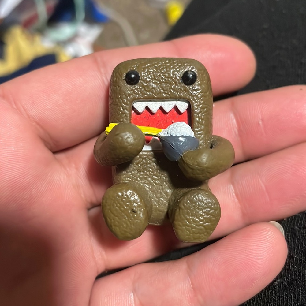 DOMO eating collectible figure